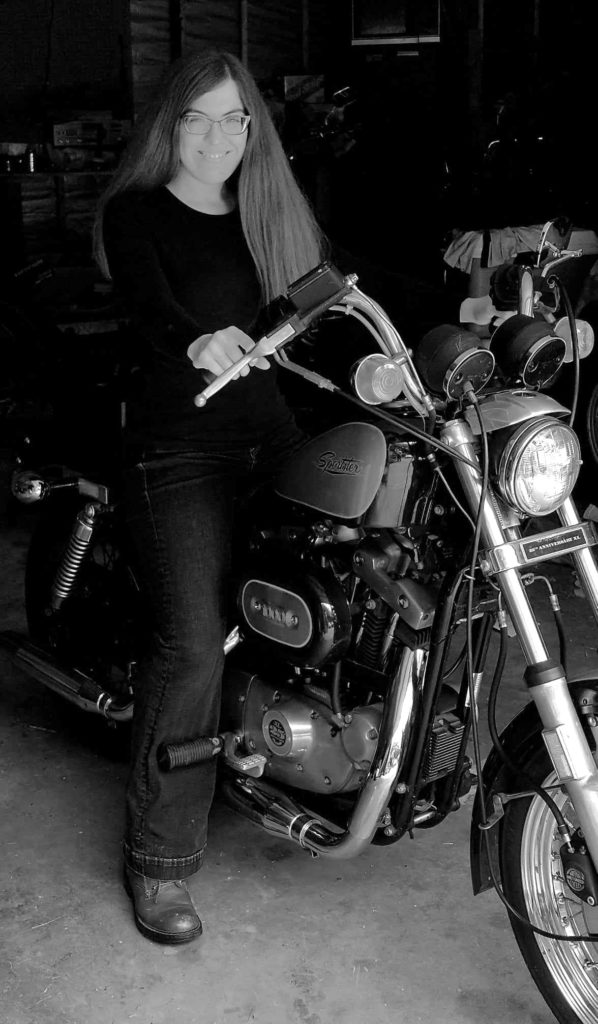 author Cindy L. Sell photo on motorcycle